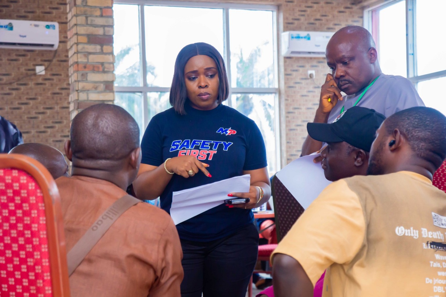 Ugwu Chinedu engaging Ijeoma Ogudebe of MainPower on the Umujioka Community complaint